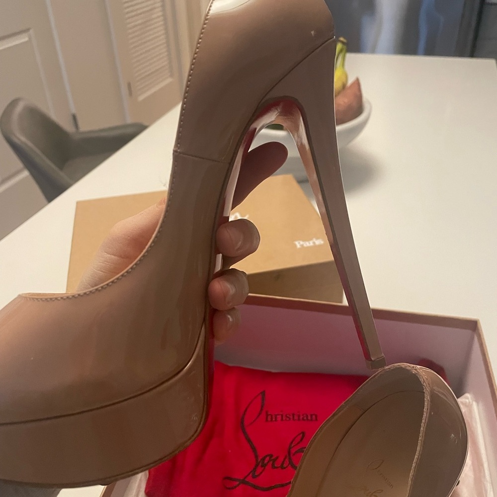 Patent lady peep Louboutin perfect condition worn once slight scruff bottom 39